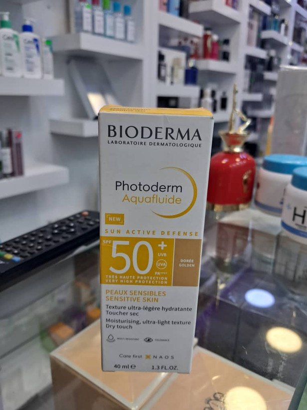 مرطوب کننده و ضد آفتاب بیودرما مدل Photoderm Aquafluide رنگ طلایی حجم 40 میلی لیتر 