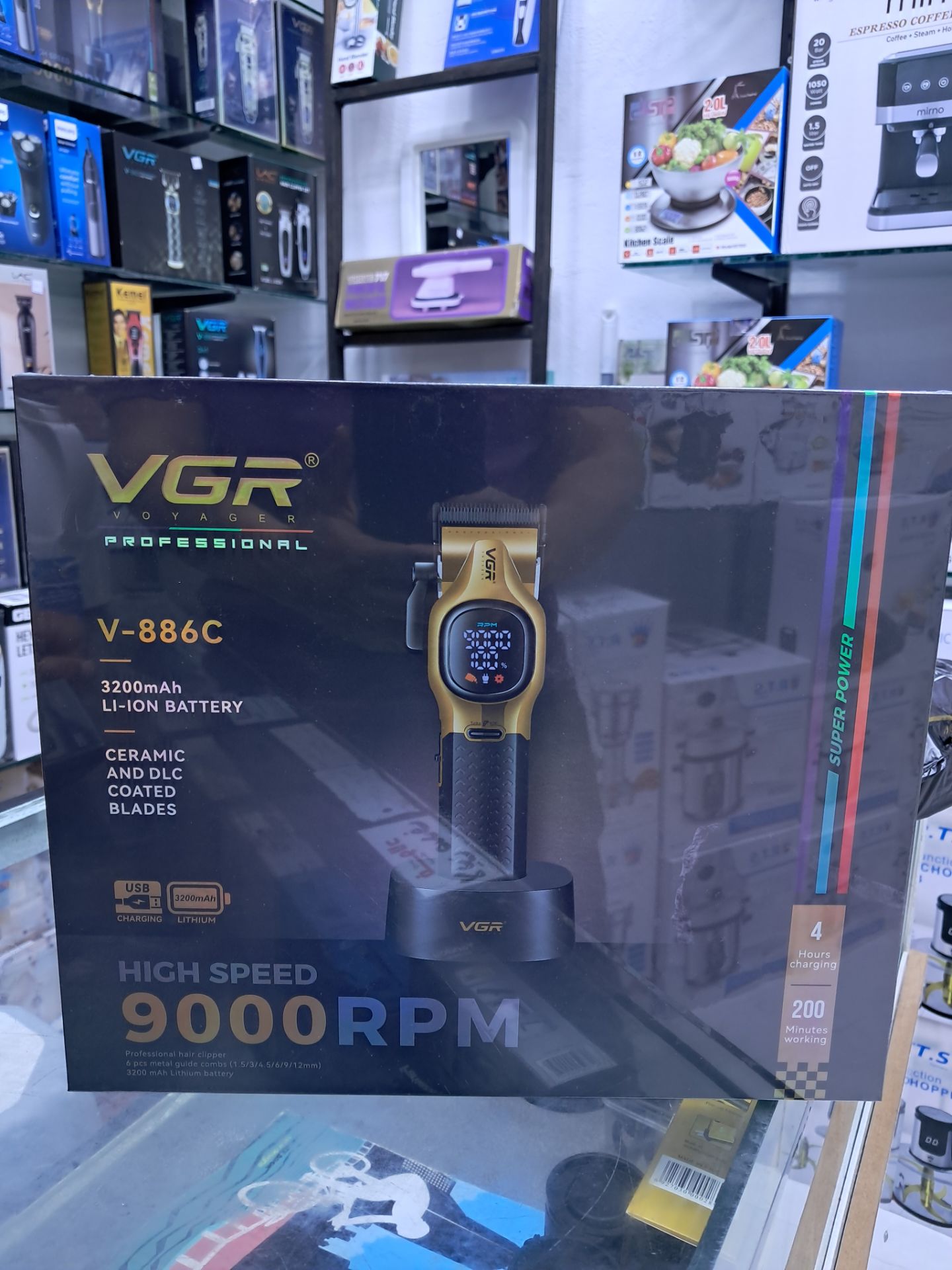 ماشین اصلاح موی سر و صورت وی جی آر مدل V-886C حرفهای شارژی طلایی مشکی 